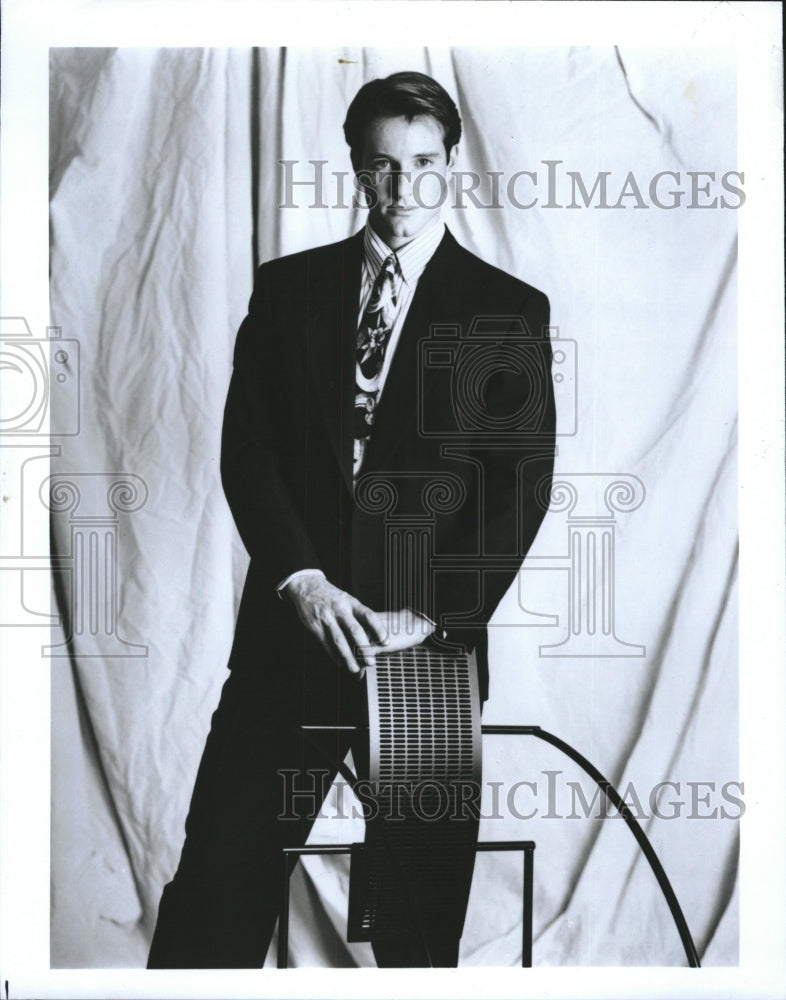 1991 Press Photo Navy shadow stripe suit, by Luciano Franzoni - Historic Images