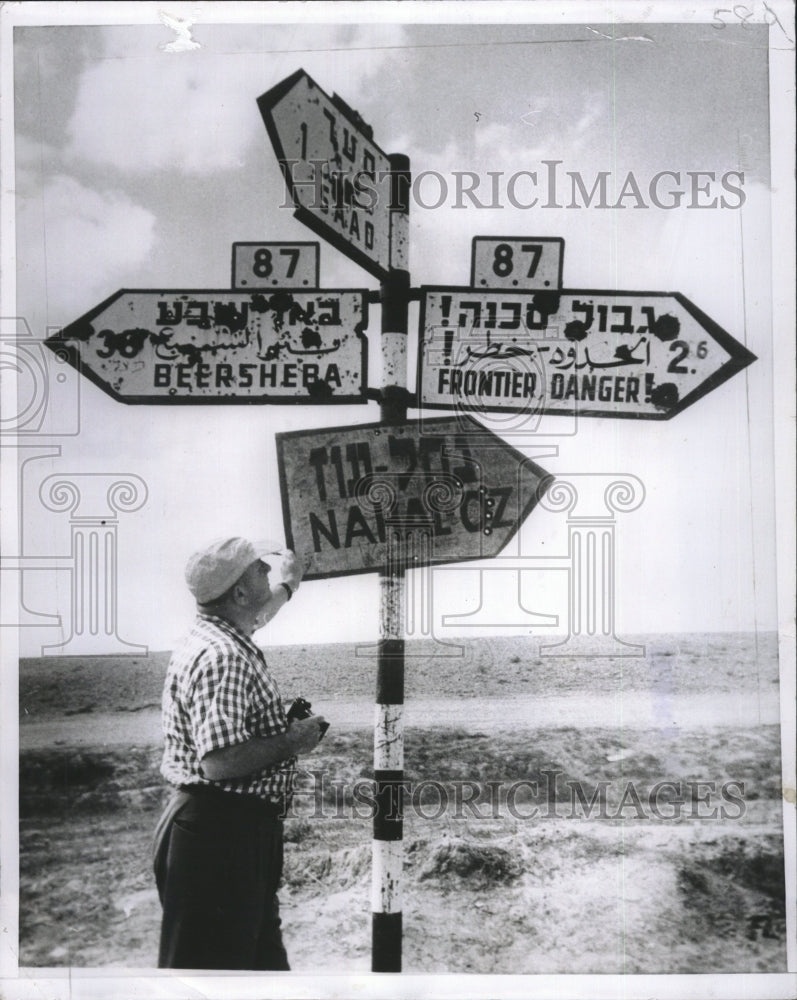 1956 Writer Erwin Savelson Inspects Frontier Sign Near Gaza - Historic Images