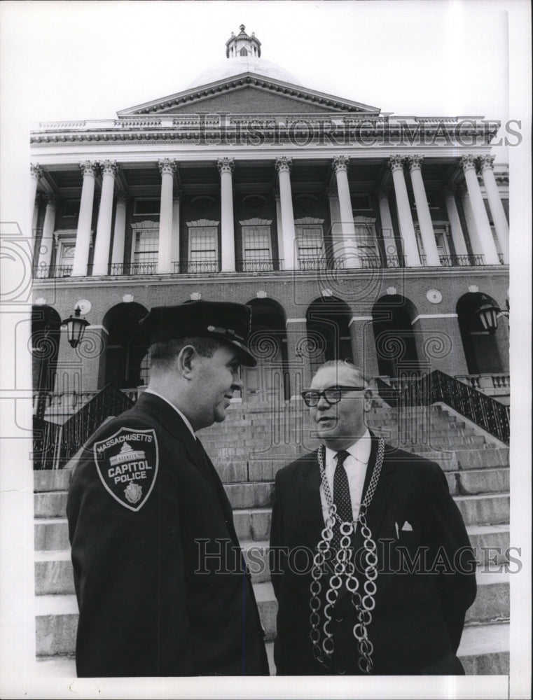 1965 Press Photo Mayor Kevin Morris is greeted by Police officer Peter Murphy - Historic Images