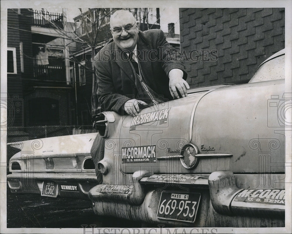 1962 Press Photo Edward &quot;Knocko&quot; McCormack&#39;s Father Places Bumper Sticker on Car - Historic Images