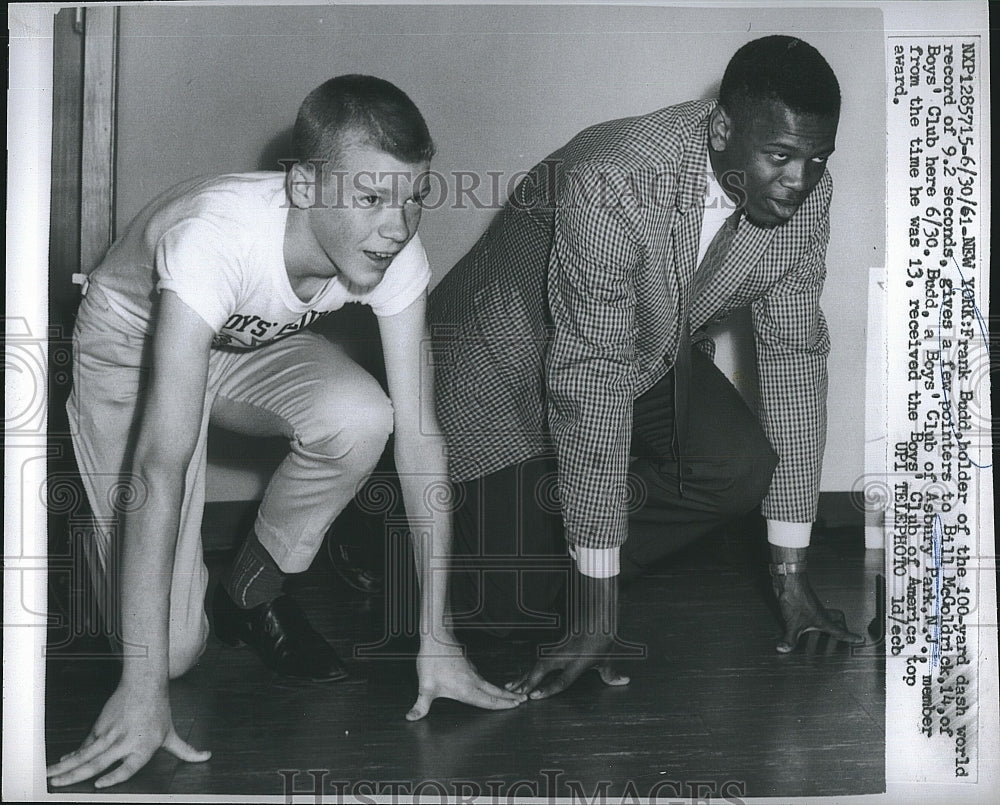 1961 Press Photo Track Champ Frank Budd give pointers to Bill McGoldrick. - Historic Images