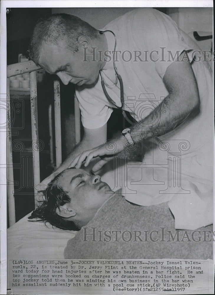 1957 Press Photo Jocky Ismael Valenzuela treated by Dr Jerry FLint - Historic Images