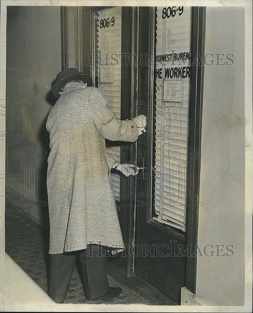 1956 Press Photo Government worker at Communist Worker office - Historic Images