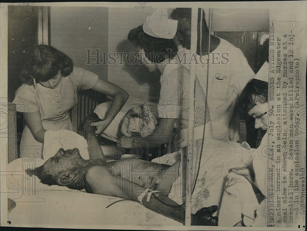 1948 Press Photo Nurses attend to a miner burned in an explosion at the - Historic Images