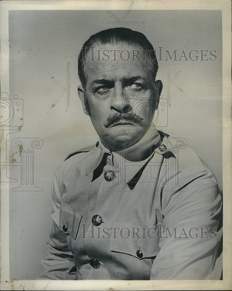 1958 Press Photo An actor in a military uniform for a film role - Historic Images