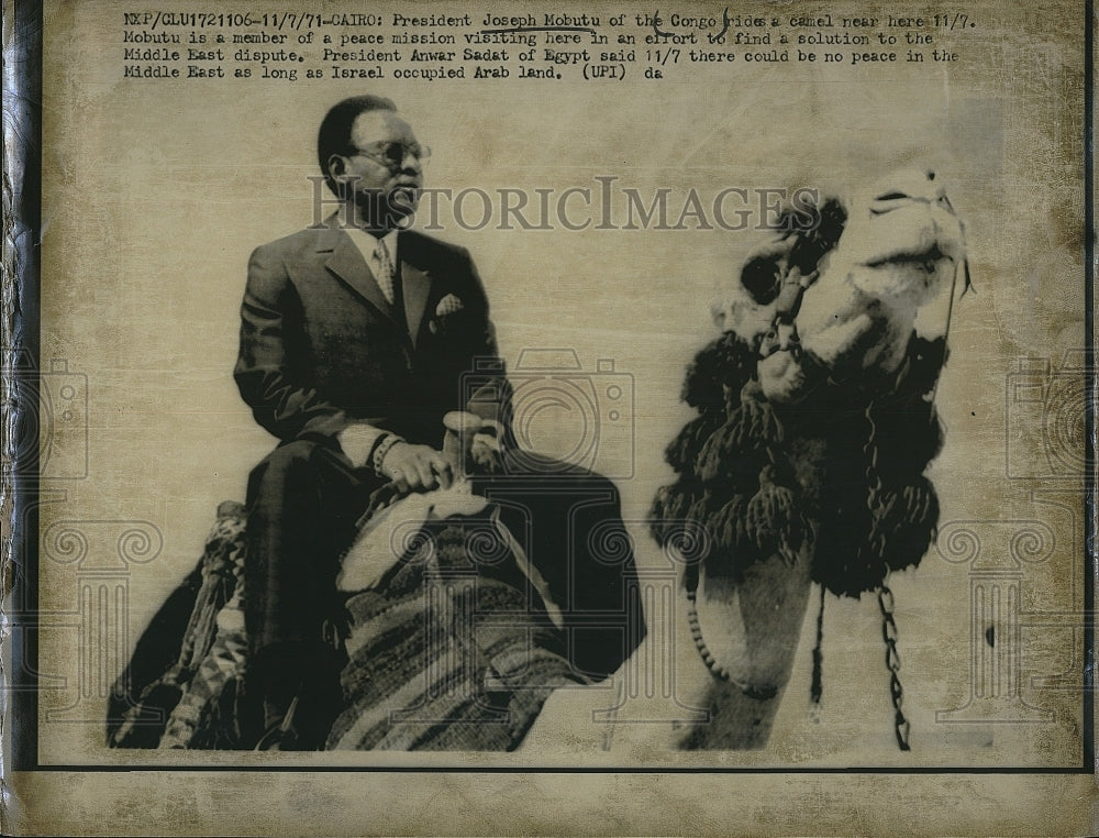 1971 Press Photo President Joseph Mobutu of the Congo Rides Camel - Historic Images