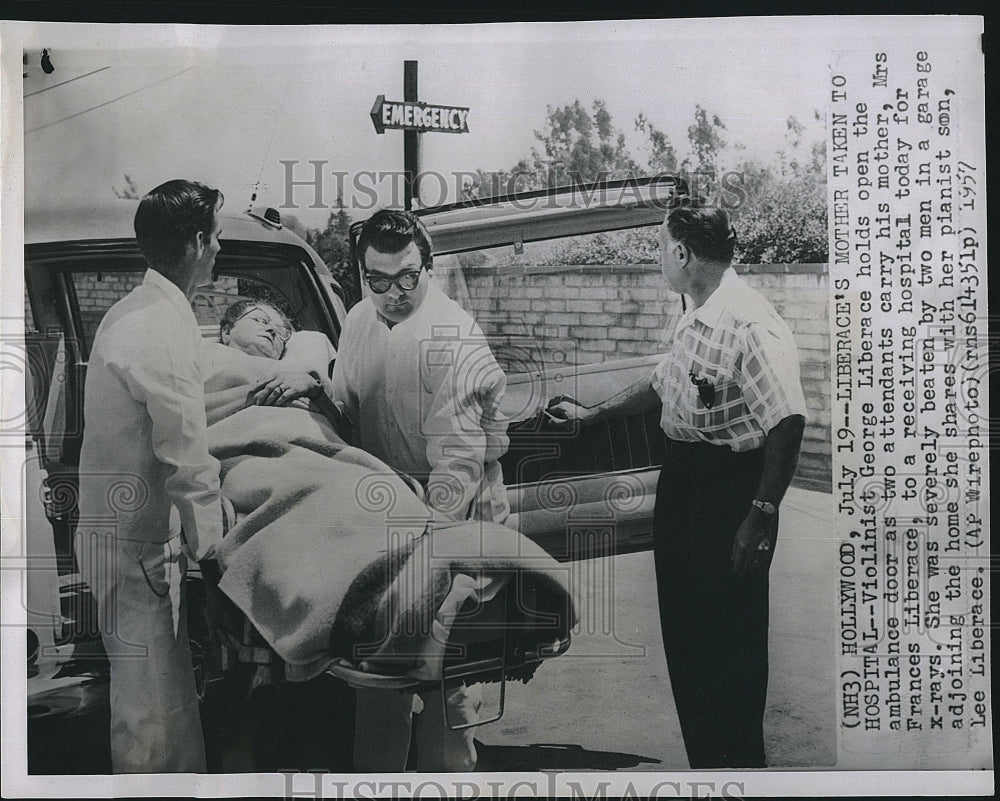 1957 Press Photo Liberace&#39;s mom taken to hospital &amp;as dad George looks on - Historic Images