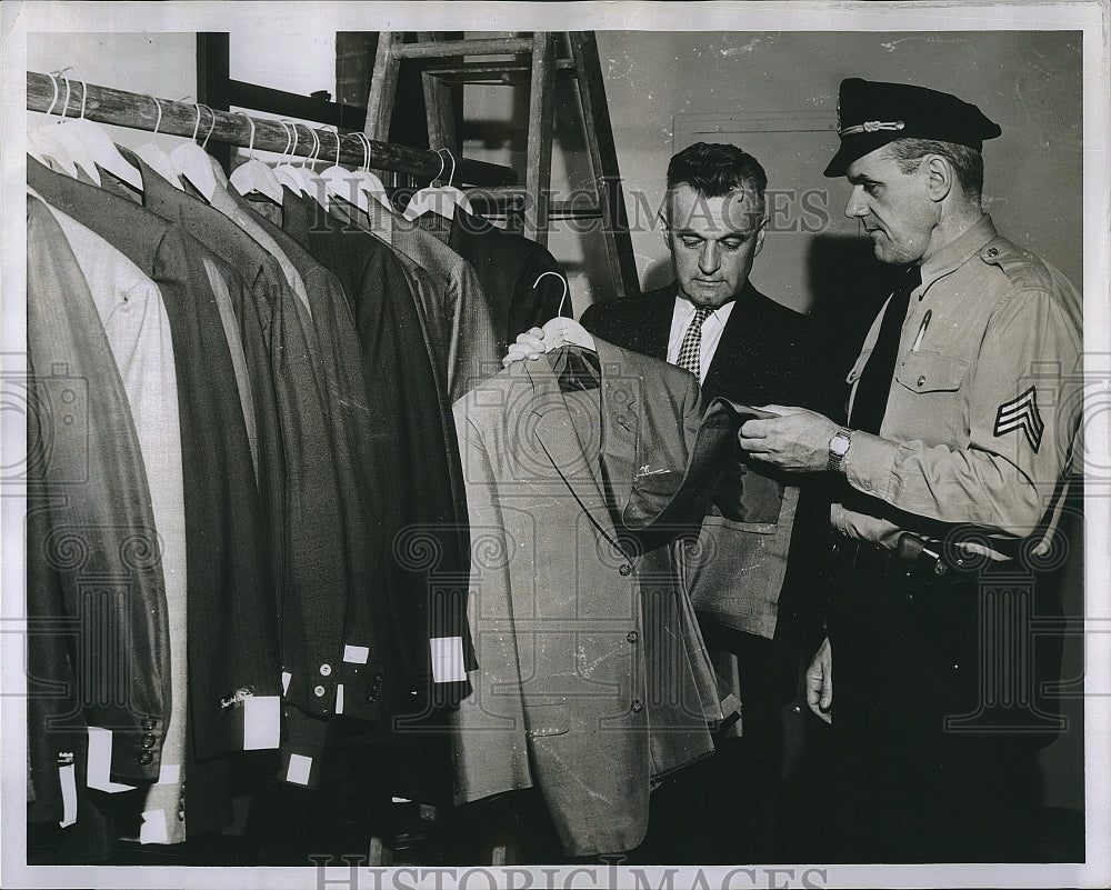 1958 Press Photo Patrolman Thomas Lawlor, Sgt. Thomas Barron with stolen suits - Historic Images