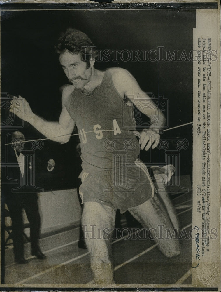 1975 Press Photo Sub 4 minute miler Marty Liquori at atrack meet - Historic Images