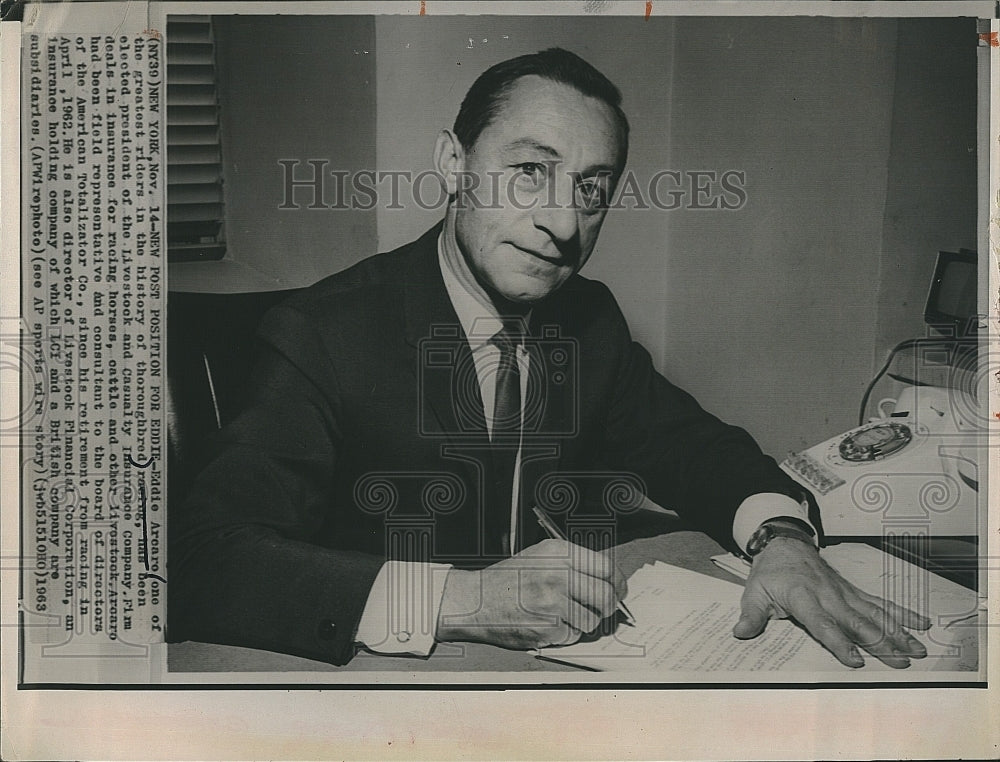 1963 Press Photo Horse Race Jockey Eddie Arearo Sitting At Desk Writing - Historic Images