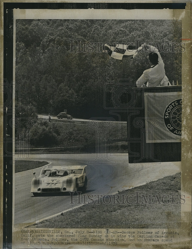 1973 Press Photo George Follmer gets the checkered flag - Historic Images