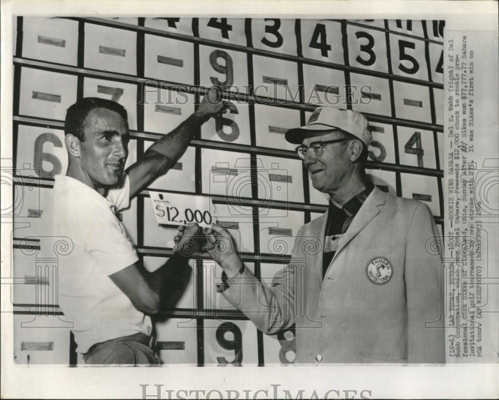 1964 Press Photo Owner Hotel Sahara Del E. Webb presents check to Dick Sikes, - Historic Images