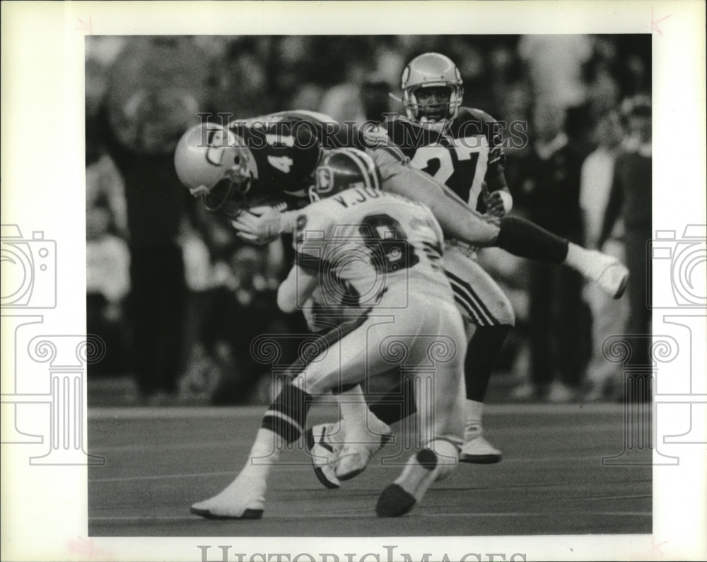 1990 Press Photo Eugene Robinson, Seahawks, 41, Vance Johnson, Broncos - Historic Images