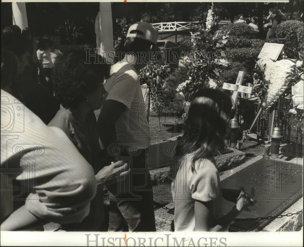 1979, Three Bronze Tablets mark the Graves of the Presleys - Historic Images