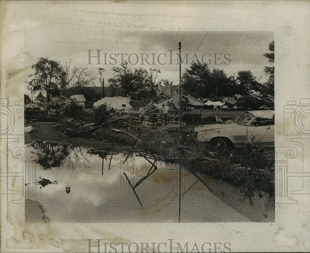 Man surveys large damaged area after tornado.-Historic Images