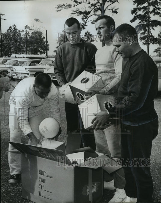 1961 Press Photo Alabama National Guardsmen receive volleyball to help keep fit. - Historic Images