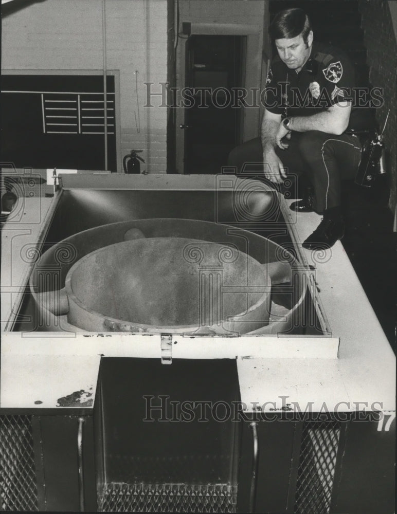 1978, Alabama-Birmingham Police Officer views Bomb Trailer&#39;s chamber. - Historic Images