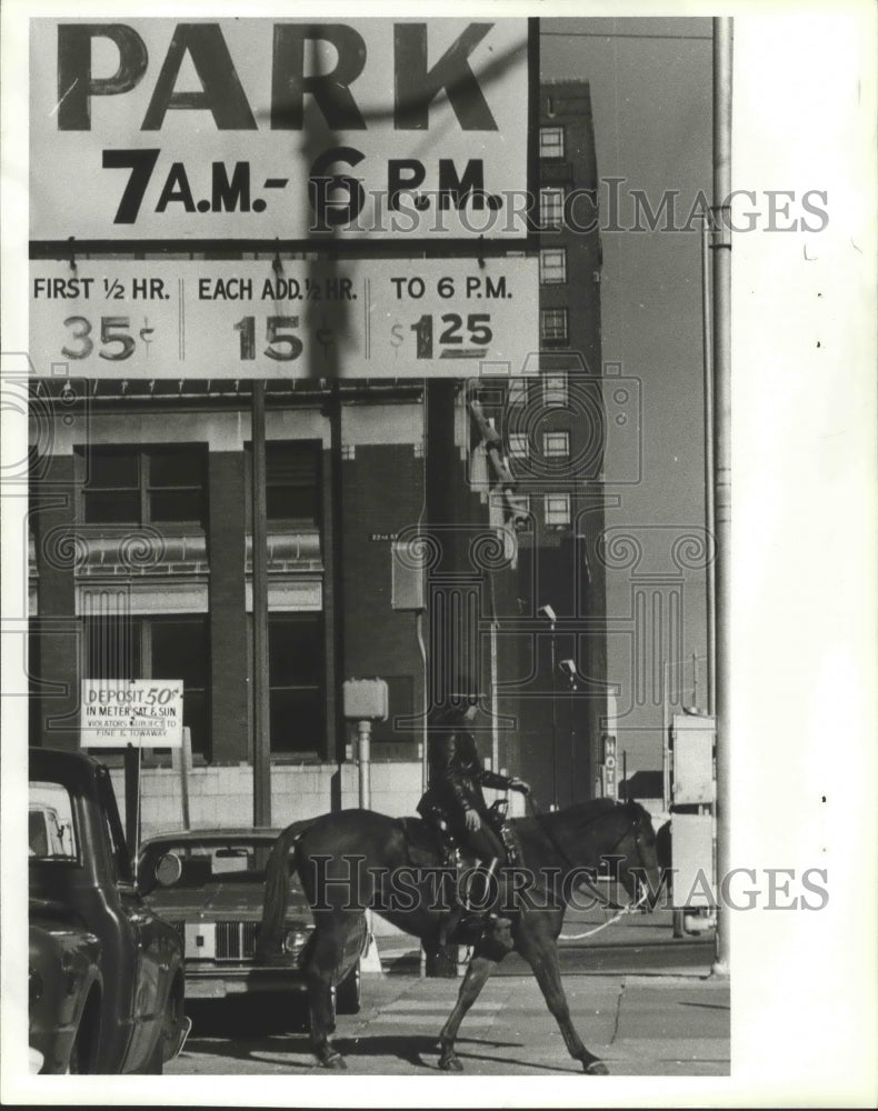 1979, Alabama-Birmingham Mounted Patrol Officer in parking lot. - Historic Images