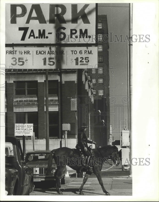 1979, Alabama-Birmingham Mounted Patrol Officer in parking lot. - Historic Images