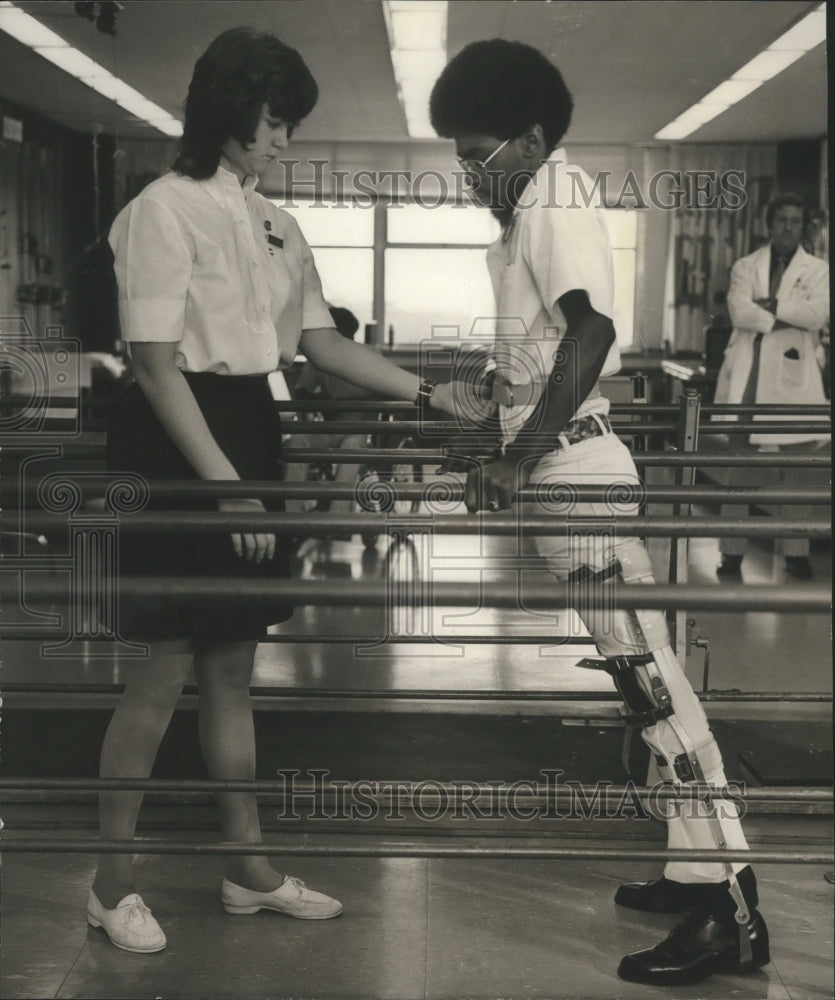 1972, Alabama-Birmingham-Spain Rehabilitation therapist demonstrates. - Historic Images