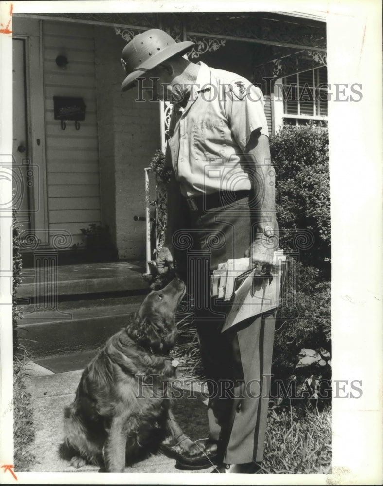 1979 Alabama-Birmingham Postal Worker is greeted by dog as he works.-Historic Images