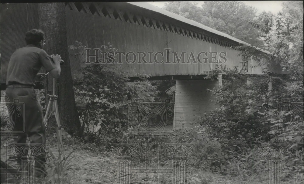 1972, Alabama-Covered bridge buff photographs Rustic Span at Nectar. - Historic Images