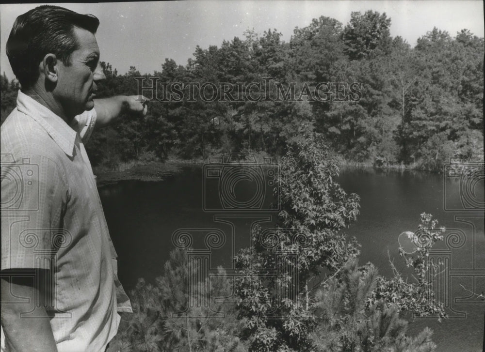 1972, Wayne Nichols Points Where Son Drowned in Alton Shale Pit - Historic Images