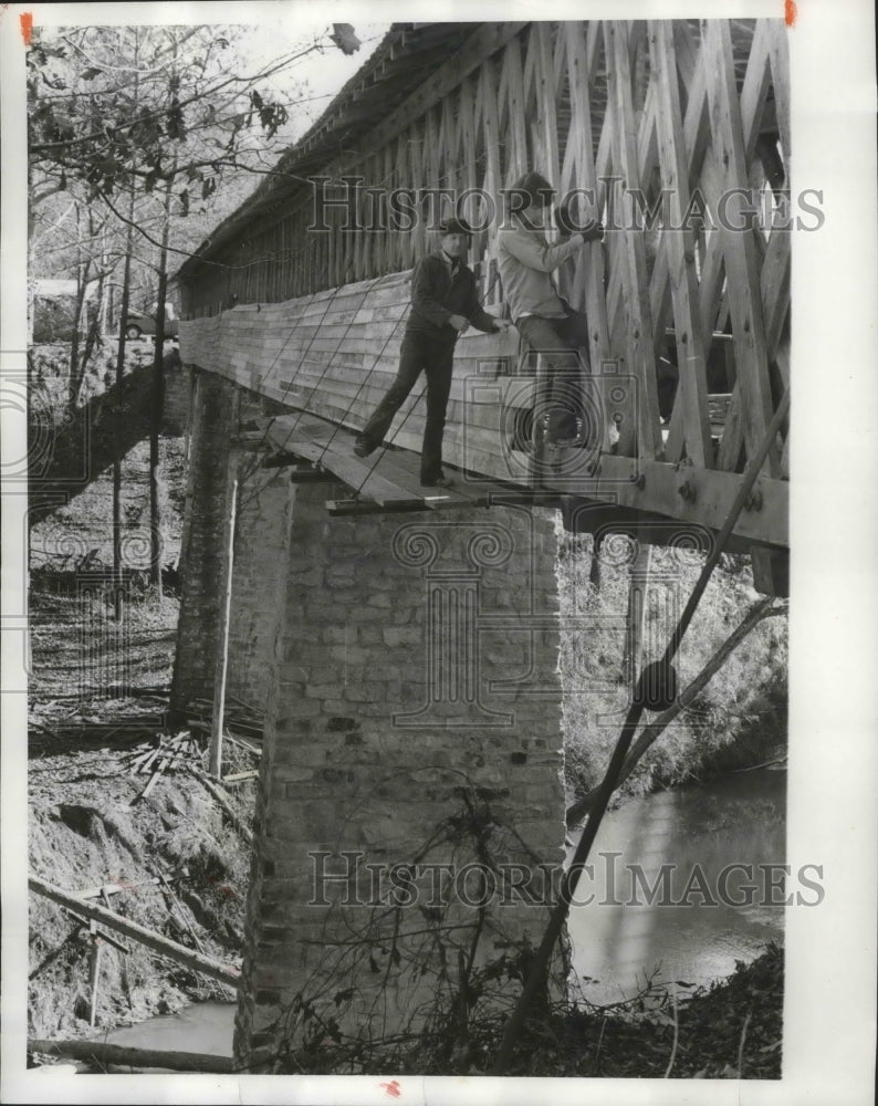 1974 Alabama-Workers on old covered bridge 45 feet above water.-Historic Images