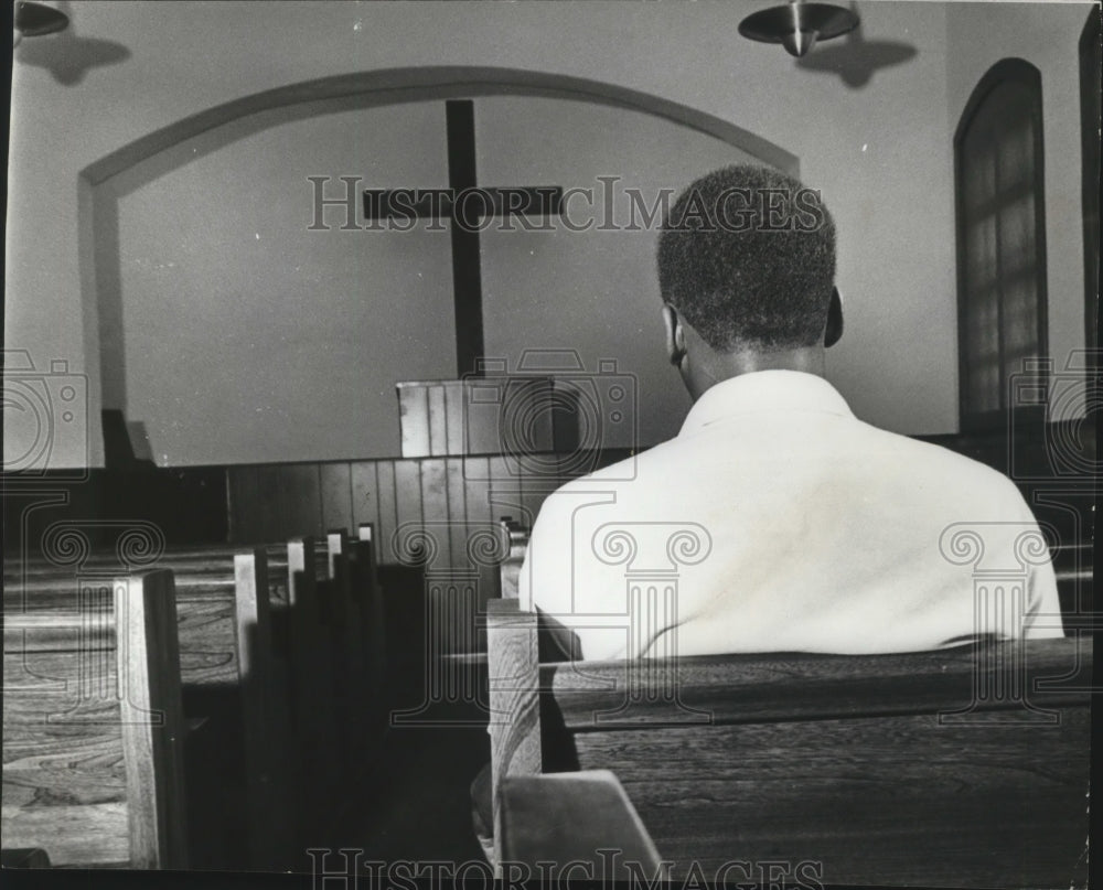 1972, Alabama-Man sits in renovated chapel at Birmingham city jail. - Historic Images