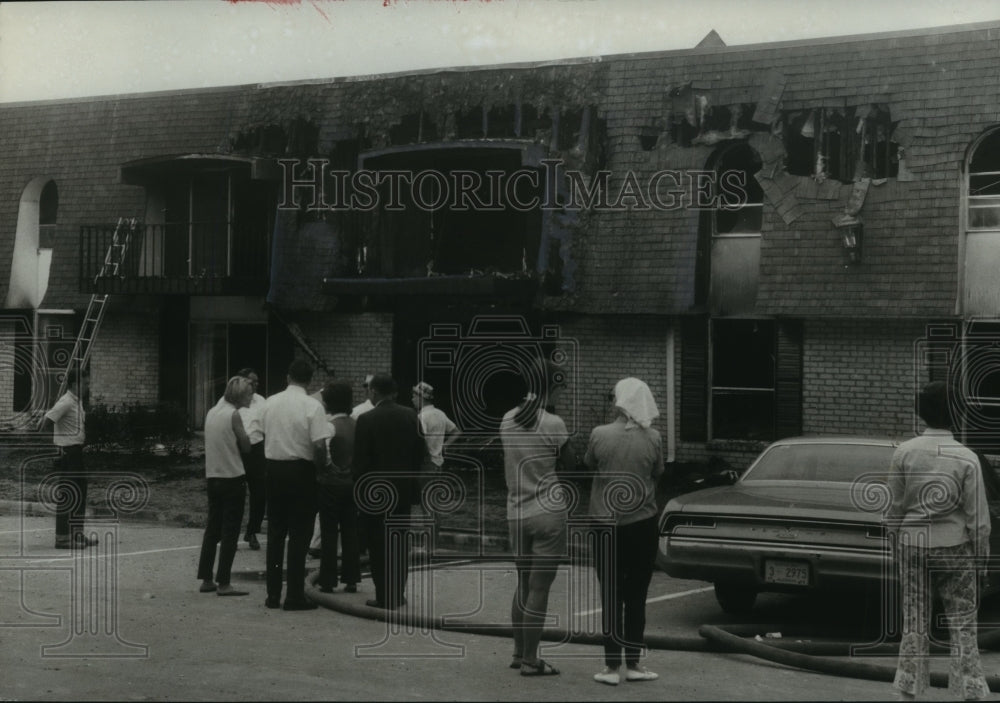 1969, Alabama-People view fire damage to Mayfair Chateau apartments. - Historic Images