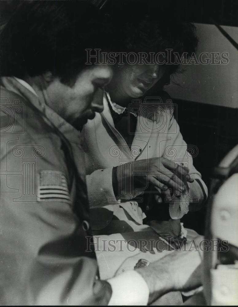 1981, Hatton Fire-Medic Gary Oliver Administering Aid to Victim - Historic Images