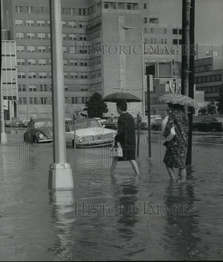 1967 Women Cross Flooded Southside Street, Birmingham, Alabama - Historic Images