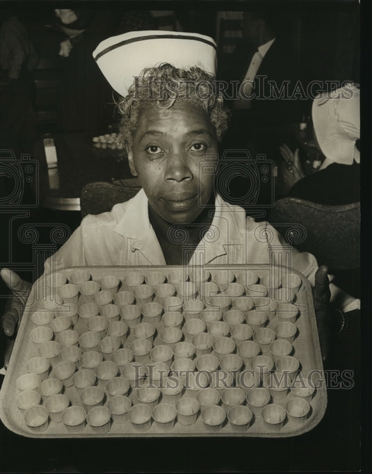 1963, Alabama-Birmingham-Nurse holds does of Sabin oral vaccine. - Historic Images