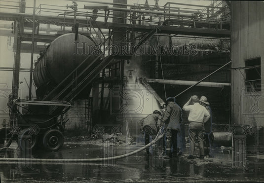 1971 Alabama-Fire officials examine Allied Chemical Plant in Wylam.-Historic Images