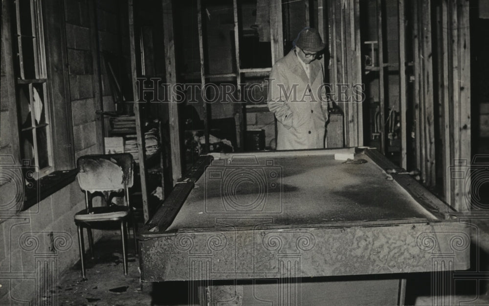 1971, Alabama-Talladega-State Fire Marshal inspects fire damage. - Historic Images