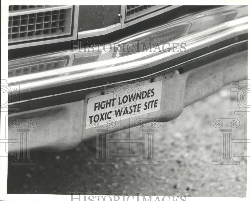 1983 Press Photo Alabama-Lowndes County protesters' Hazardous waste car sticker. - Historic Images