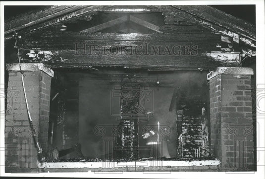 1992 Fireman Inspects Damage in Burned House, Birmingham, Alabama-Historic Images