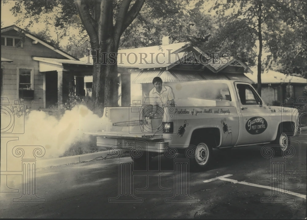 1975 man on mosquito Fogging truck, Fairfield City, Alabama-Historic Images