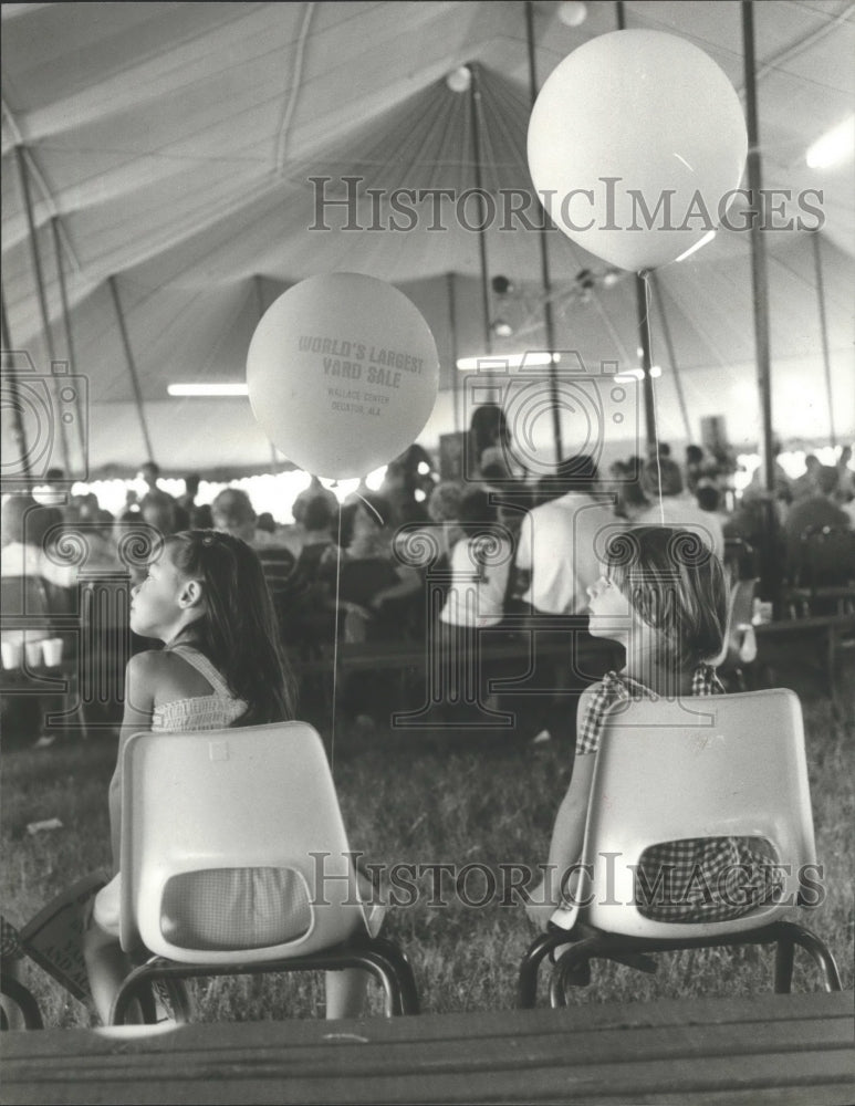 1979 Girls With Balloons at World&#39;s Largest Yard Sale, Alabama - Historic Images