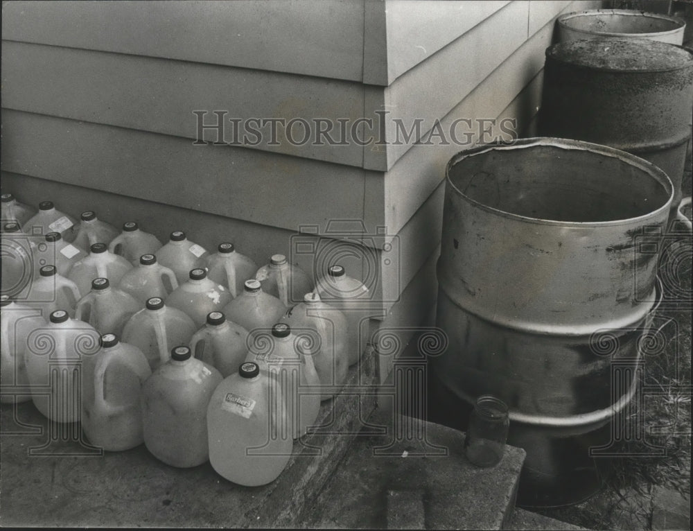 1972, Jugs filled with water for cooking, drinking, Jefferson County - Historic Images