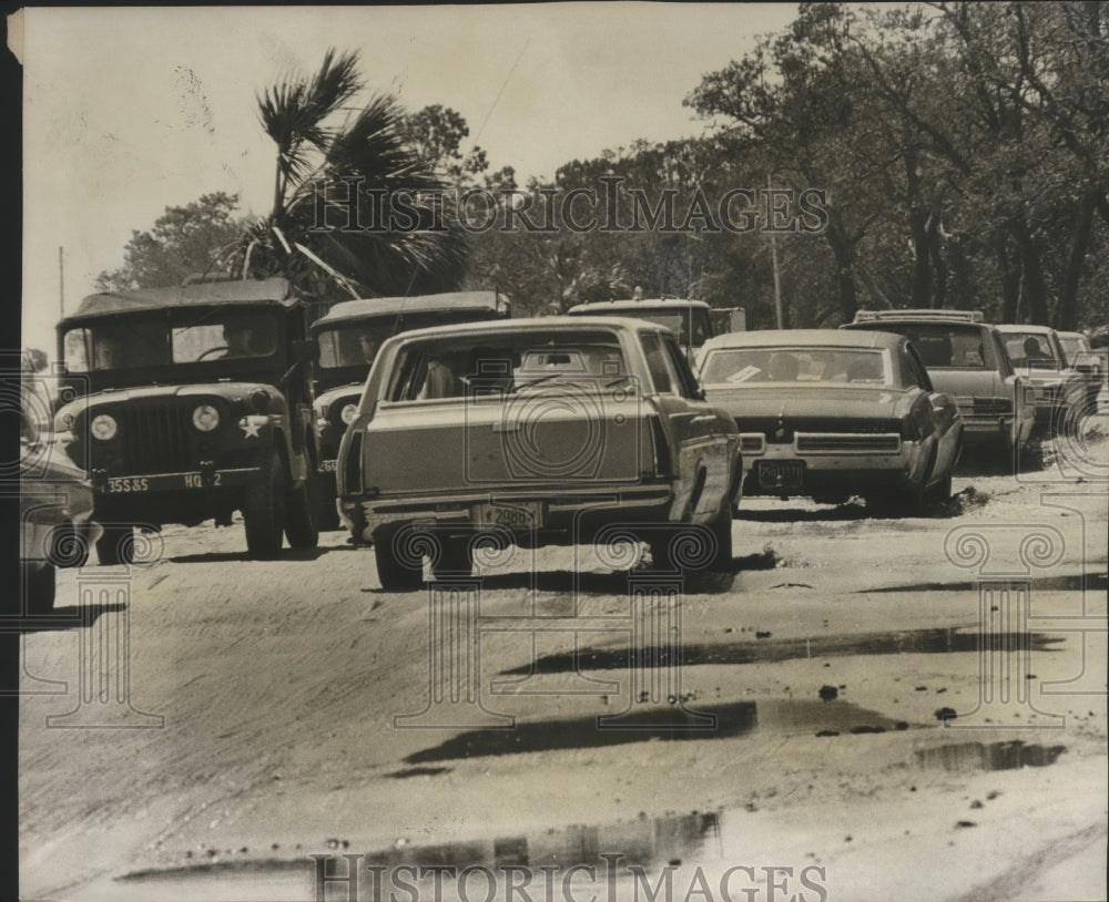 1969, Traffic on U.S. 90 in Biloxi after hurricane Camille. - Historic Images