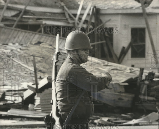 1969 Press Photo Guardsman directs traffic through Gulfport Streets, Mississippi-Historic Images