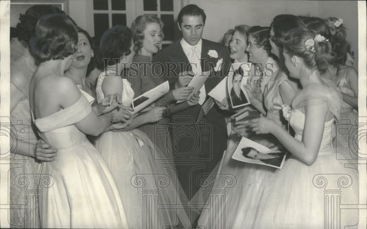 1956, Actress Gwen Harmon signs autographs in Birmingham, Alabama - Historic Images