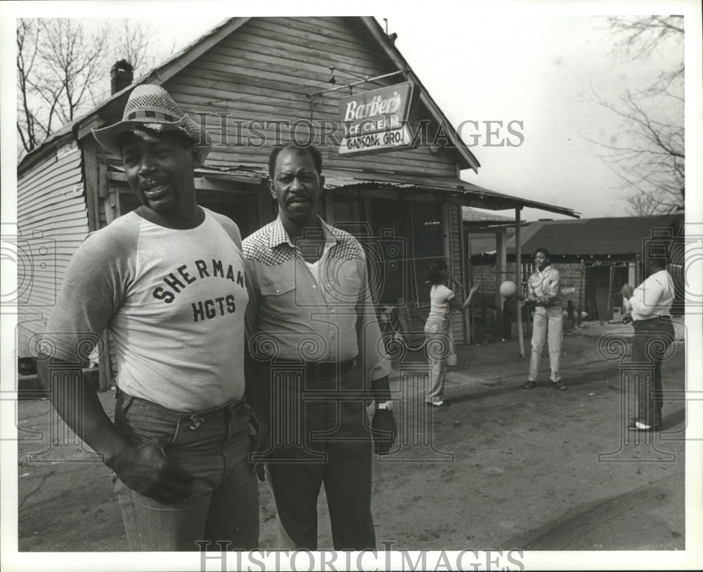 1982 Press Photo Cooke and Gadson in front of store in Sherman Heights, Alabama - Historic Images