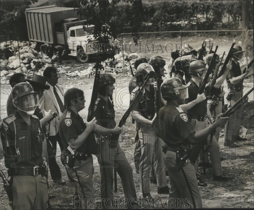1973 Deputies stand guard over garbage loading, Fairfield, Alabama-Historic Images