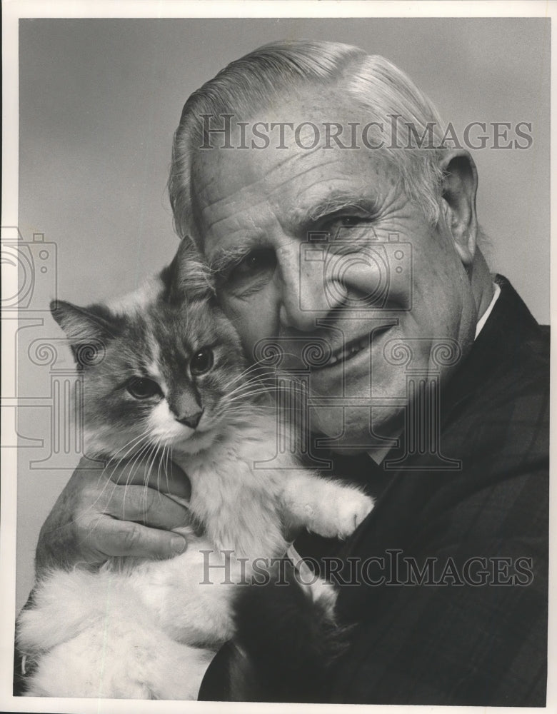 1986, Politician George Seibels with his cat &quot;Boo&quot;, Alabama - Historic Images