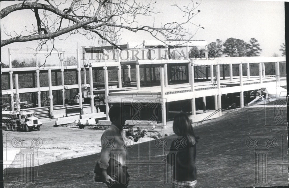 1974, Troy State University students beside Adams University Center - Historic Images