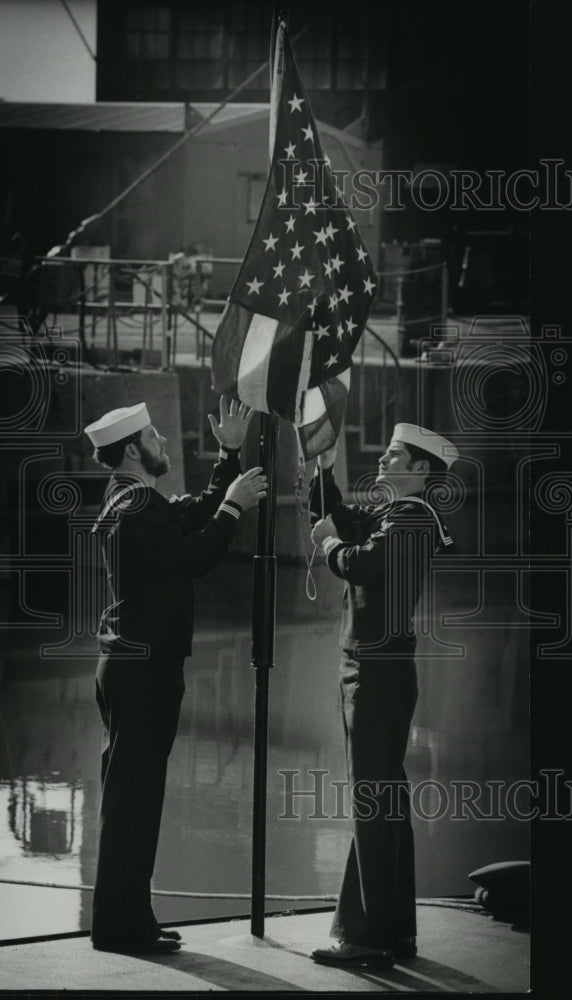 1978 Press Photo Seaman hoist the flag on the USS Birmingham - abna13053 - Historic Images