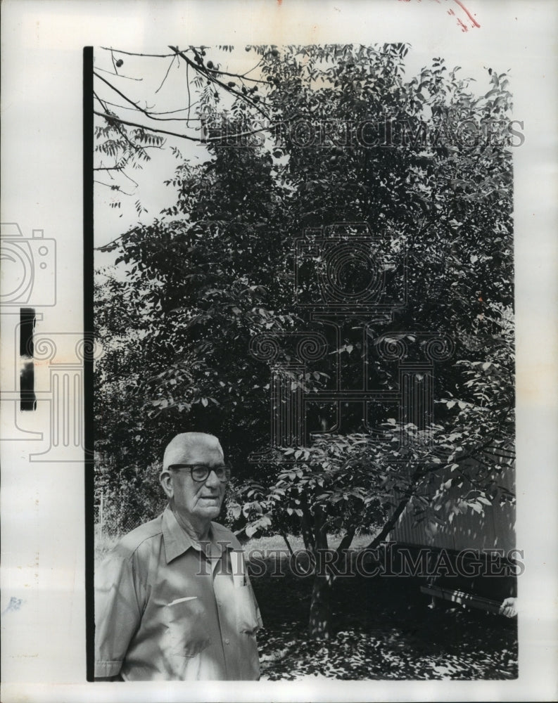 1978, Mr. Banks poses with one of his trees on his property, Alabama - Historic Images