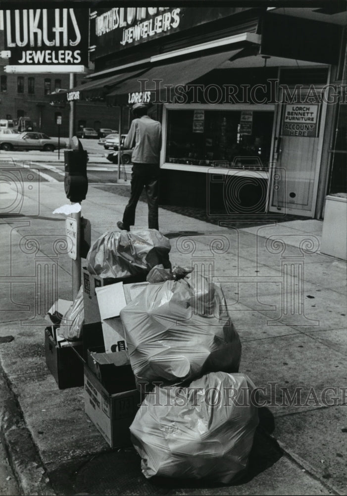 1979, Garbage lies next to Luklhs Jewelers after strike in Birmingham - Historic Images